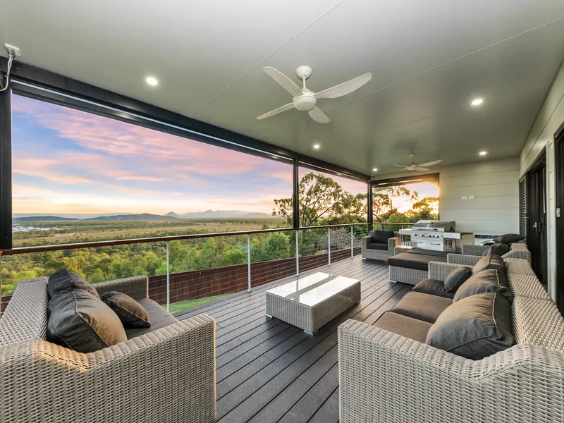 Perched on top of the hill in Bushland Beach, you'll feel like royalty driving to your home with a million dollar view