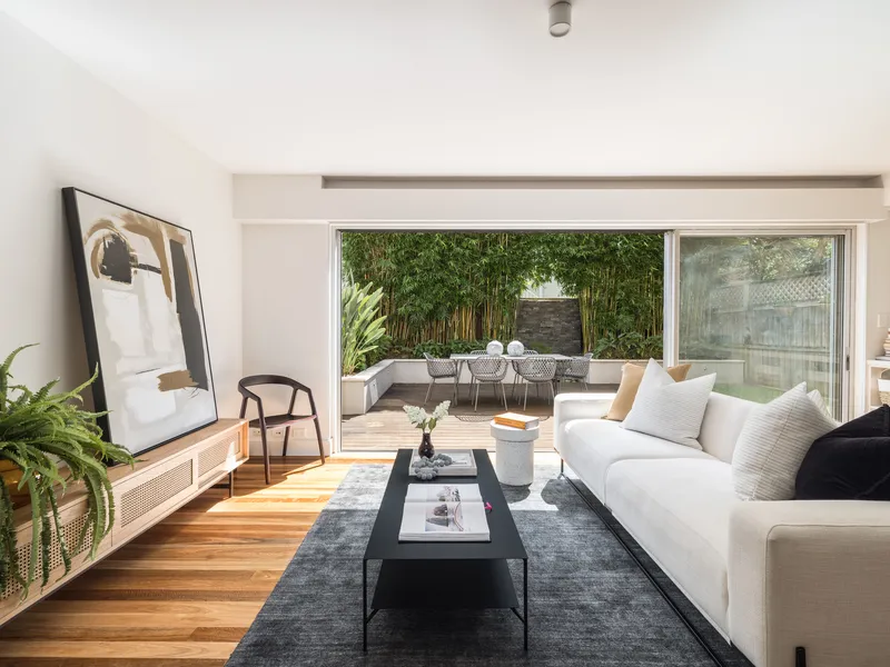 Private north-facing designer haven in the village heart