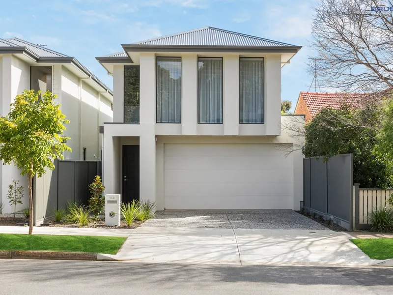 STUNNING NEW DESIGNER HOME OVERLOOKING A PARK. 2 MAIN BEDROOM SUITES. DOUBLE GARAGE.
