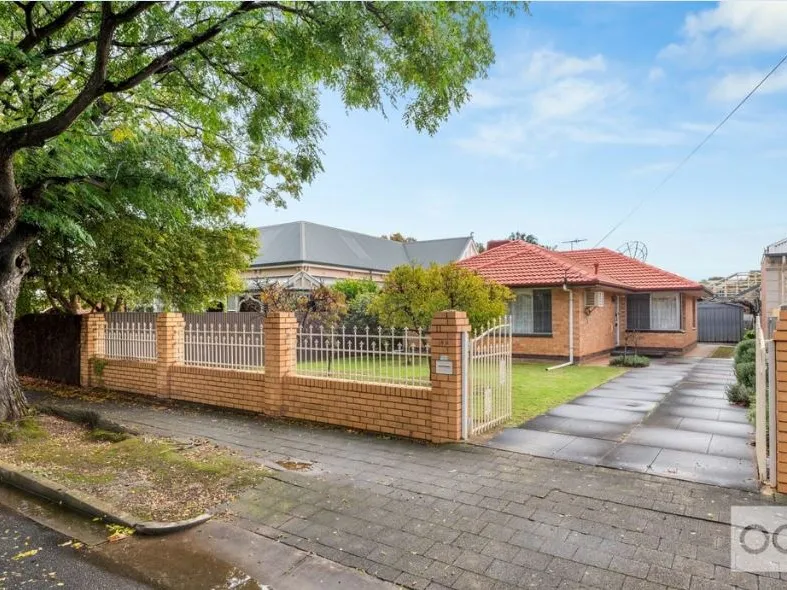 COMFORTABLE 3 BEDROOM HOME IN BLUE CHIP LOCATION