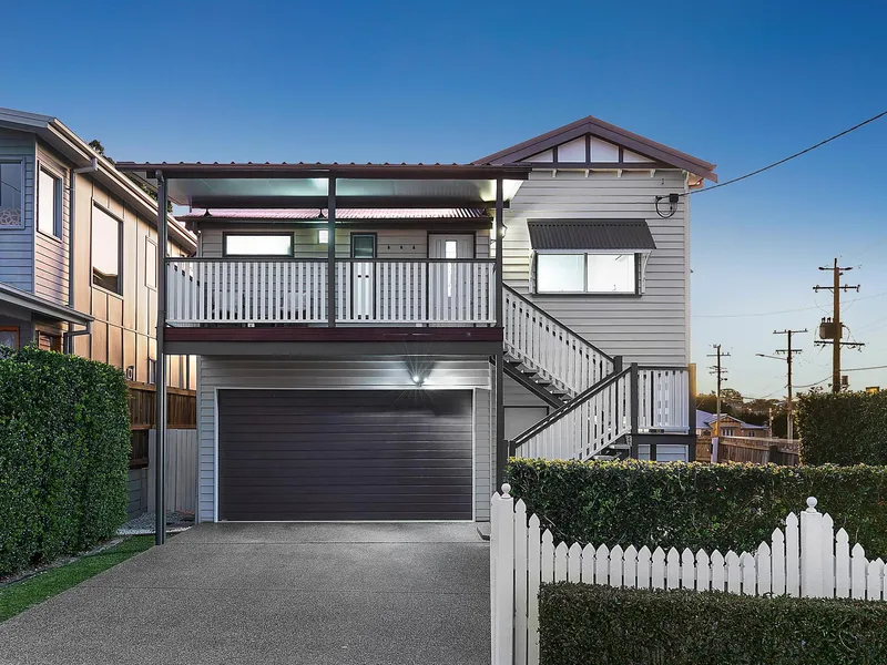 Stylishly renovated character home offers superb space.