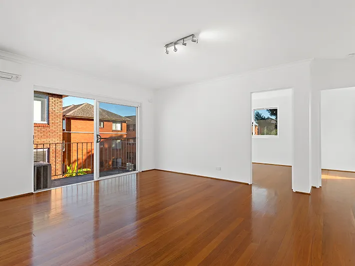 Peaceful top floor unit with carport and leafy outlooks