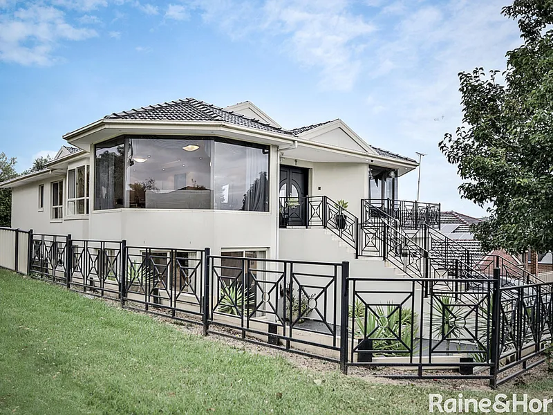 A GRAND HOME FOR 2 FAMILIES