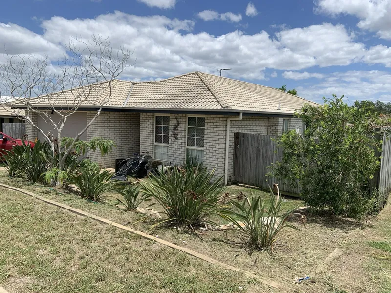 Well equipped lowset brick home