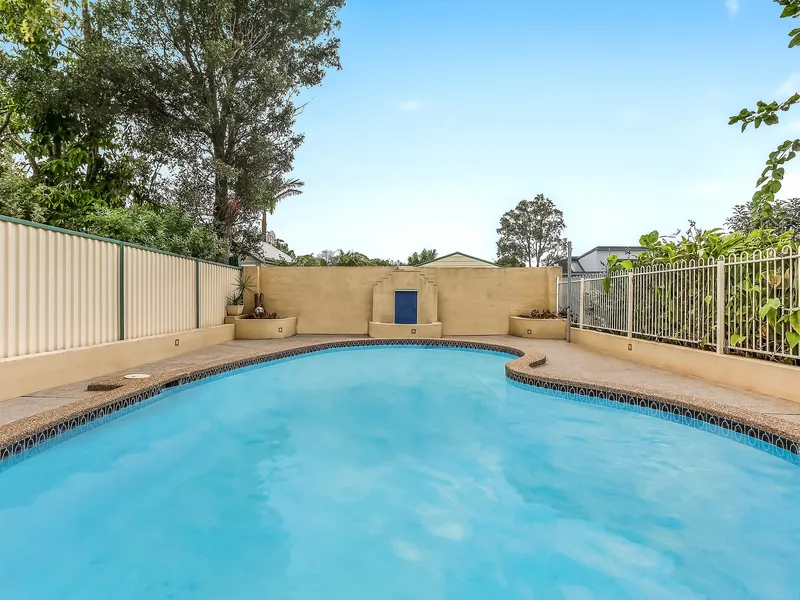 Well presented 4 bedroom home with pool