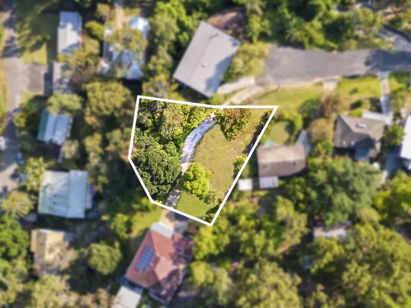 Vacant land in quiet street with water views