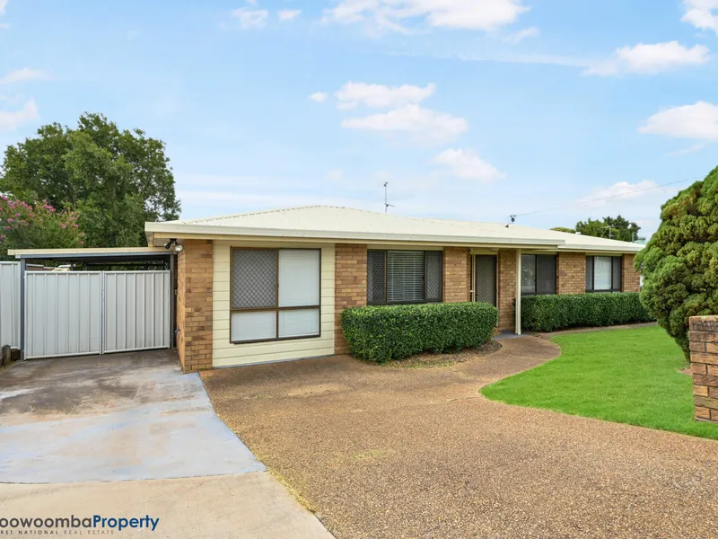 BEAUTIFUL BRICK HOME AWAITS!