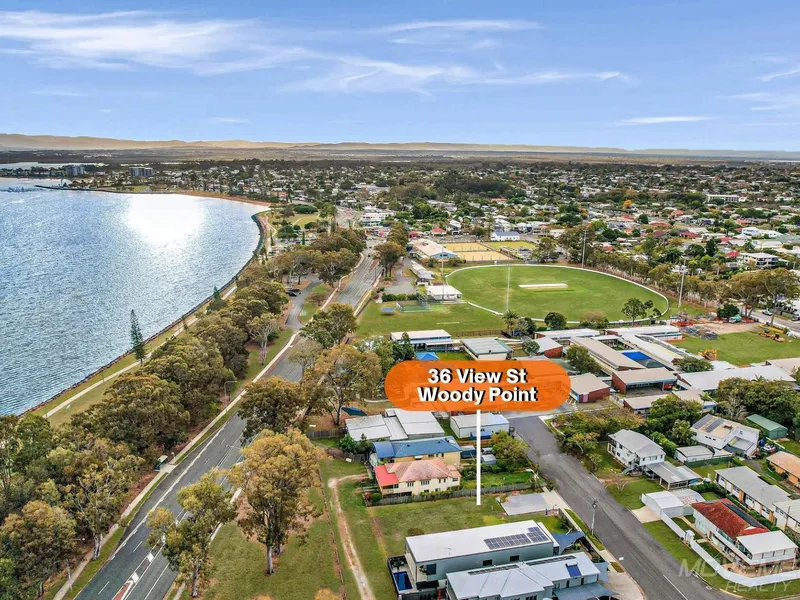 Unique Dual Opportunity: Splitable 810m² Land with Water Views in Desirable Woody Point!