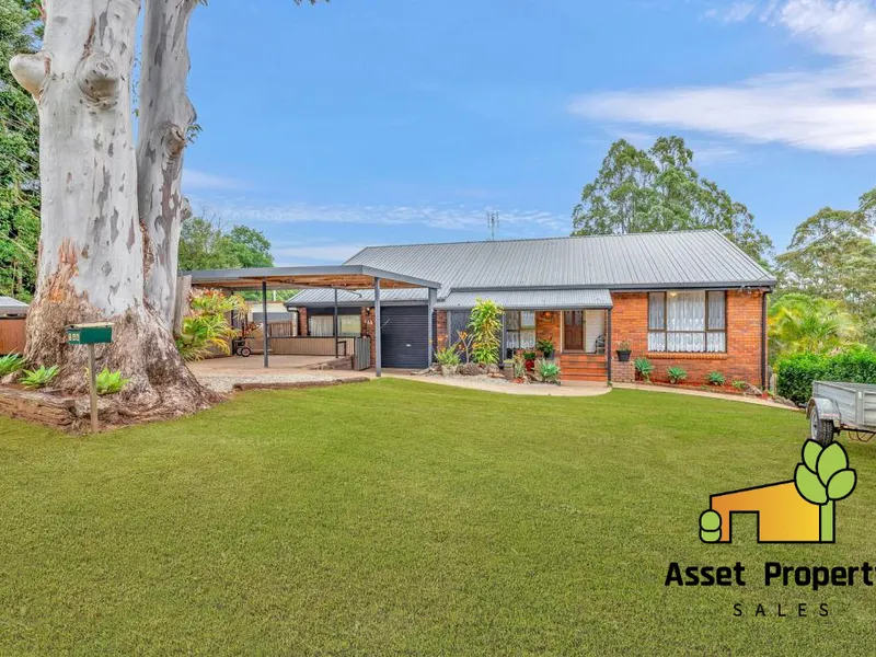 3 bedroom plus study on spacious block in a tranquil garden oasis