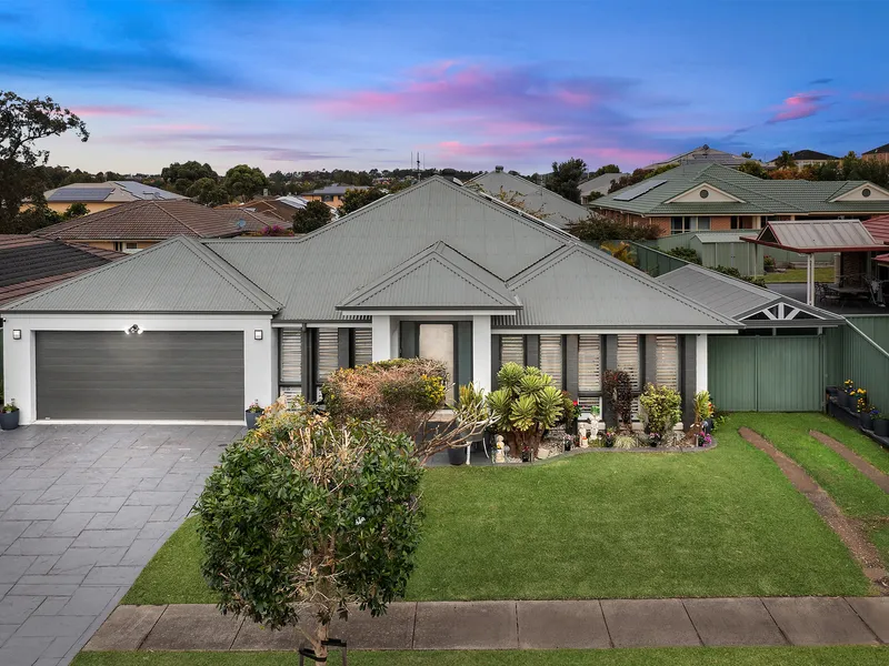 Immaculate five bedroom plus study McDonald Jones design