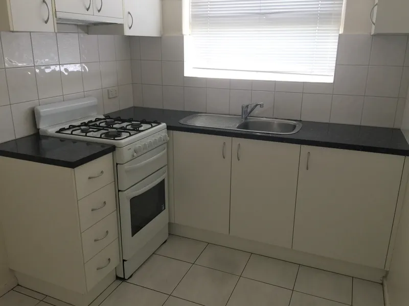 Spacious living with brand new carpets