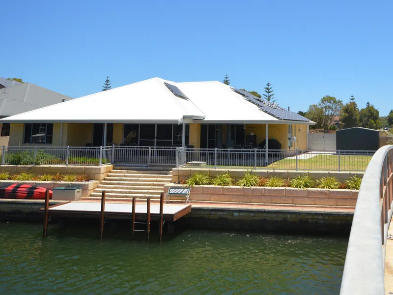 Canal Home with Side Access