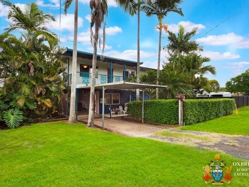 QUARTER ACRE with DUAL LIVING.