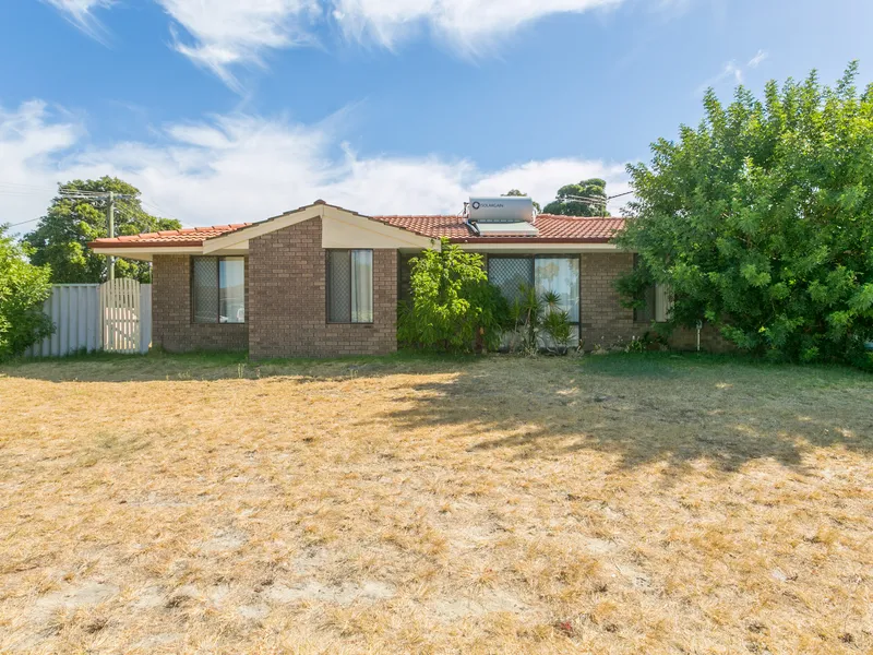 Home Filled with Possibilities on Large Subdivisible Corner Block!