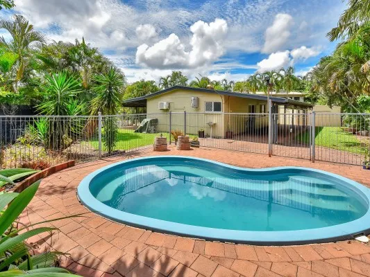 ** IT'S GOT A POOL AND A MAN CAVE!**