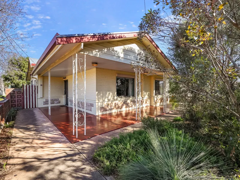 Return veranda 1925s Bungalow with Plenty of Charm and Character
