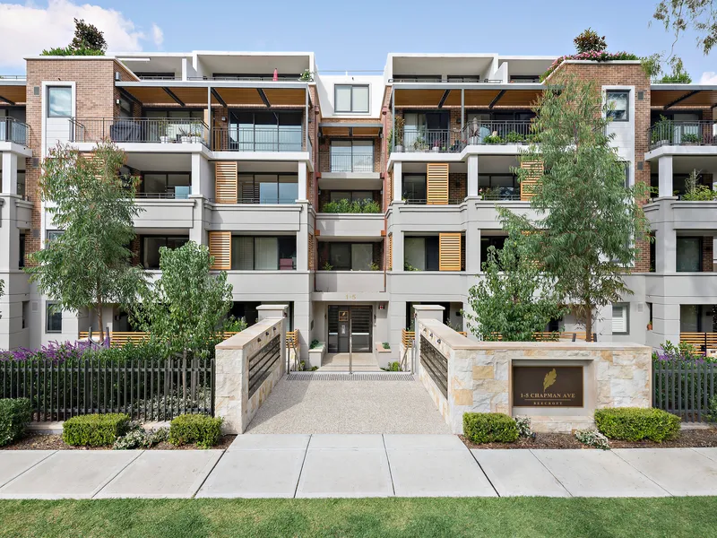 Elite top-floor apartment steps from shops