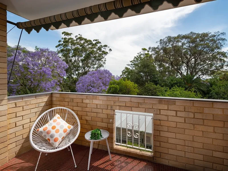 Peacefully positioned to the rear of the block 