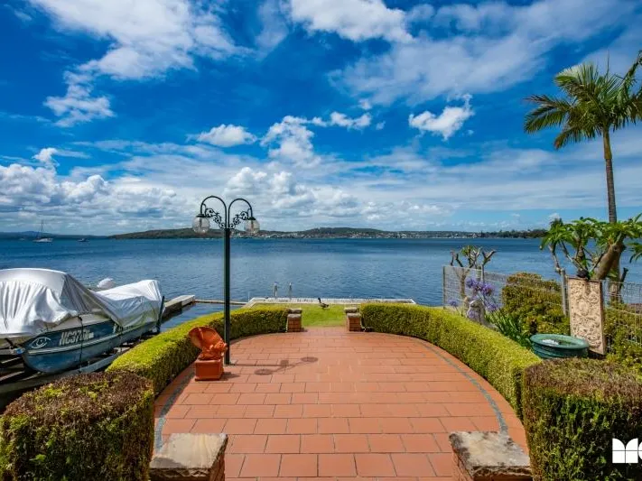Stunning Waterfront 4 Bedroom Home with Direct Lake Access