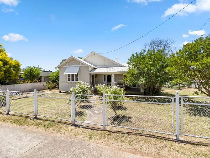 Charming Country Style Home in a Walk to Town Location
