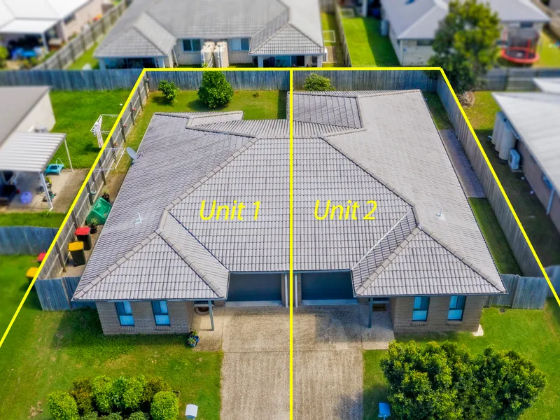 Awesome investment opportunity - duplex with two separate titles!