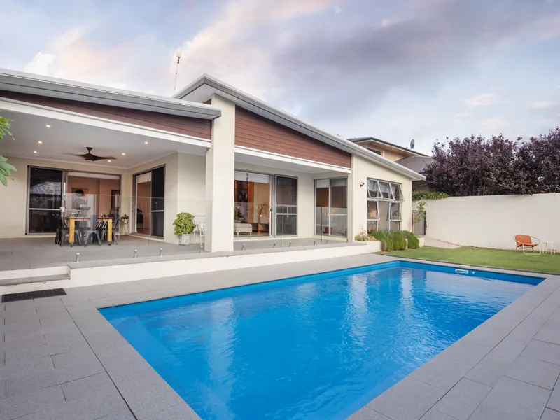 STUNNING HOME IN TREE LINED LOCATION