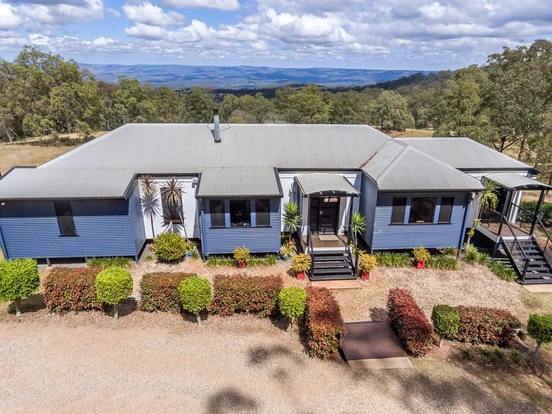 Immaculate home and grounds with magnificent range views
