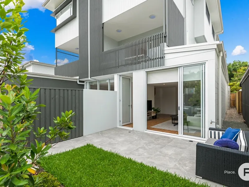 Architecturally designed townhome in sought-after suburb