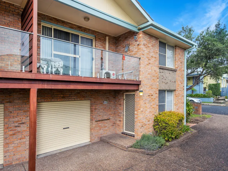 Townhouse Appeal in Sought-After Pocket          