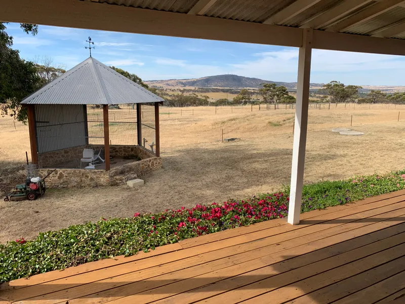 40 acres plus amazing homestead and infrastructure overlooking town WOW