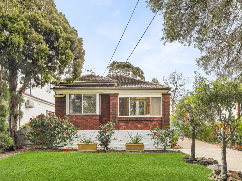 Double brick character home with north facing gardens in a premium Strathfield South address