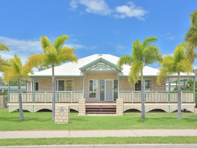 Neat & tidy brick home with side access & shed!