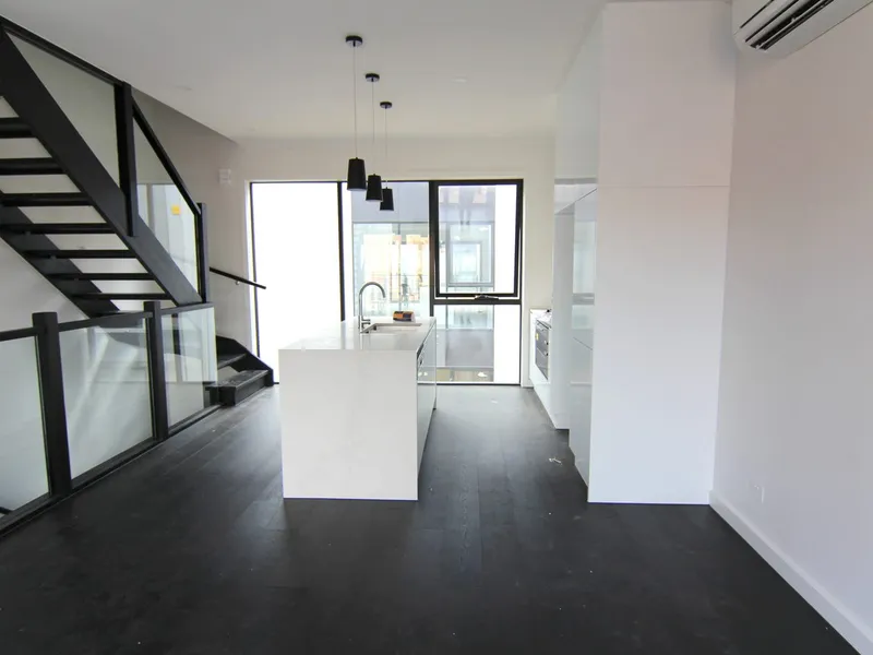 Contemporary Comfort: Spacious Three Bedroom Residence with Garage Awaits!