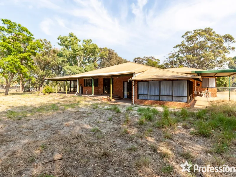 7.5 Acres and a Whopping Family Home