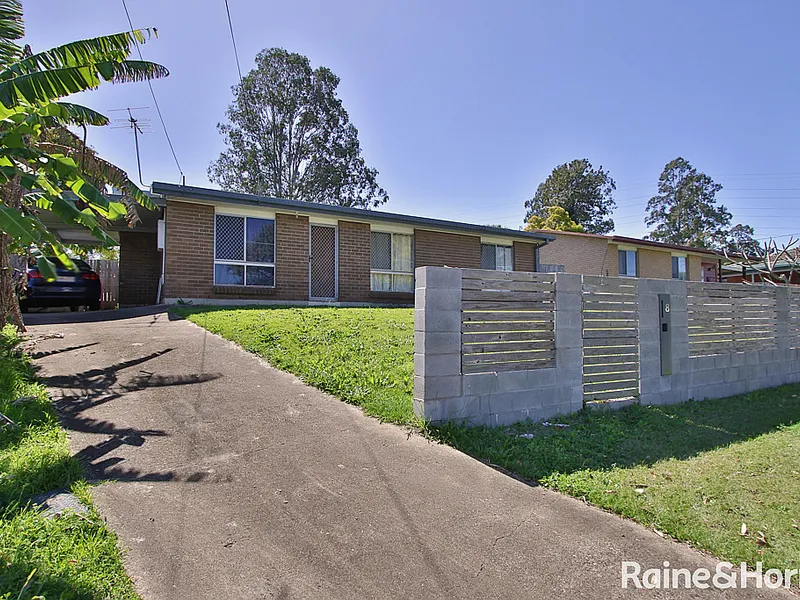 Solid brick house on the high side of the street!