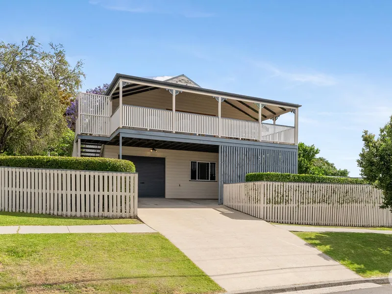 Elevated Family Home on Corner Block with Sweeping Suburban Views