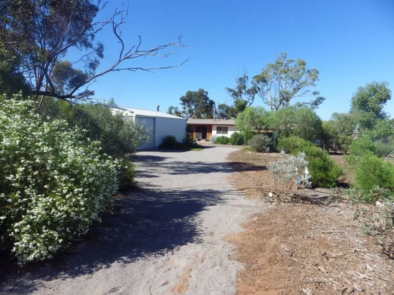 A HOME AMONGST THE GUM TREES ON 1.1551ha