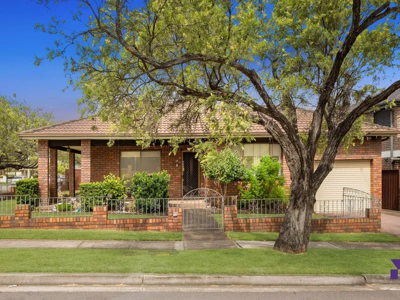 Streamlined brick family entertainer set on a sprawling 891sqm corner block