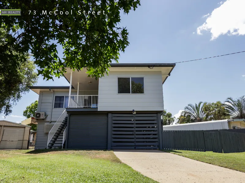 SPACIOUS HIGH-SET HOME PARTIALLY BUILT IN UNDERNEATH WITH DOUBLE BAY SHED! CLOSE TO SCHOOLS!