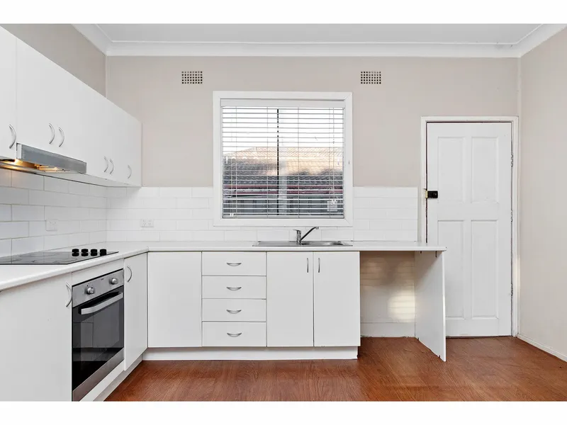 AFFORDABLE RENOVATED UNIT IN CENTRAL LOCATION  WITH PARKING