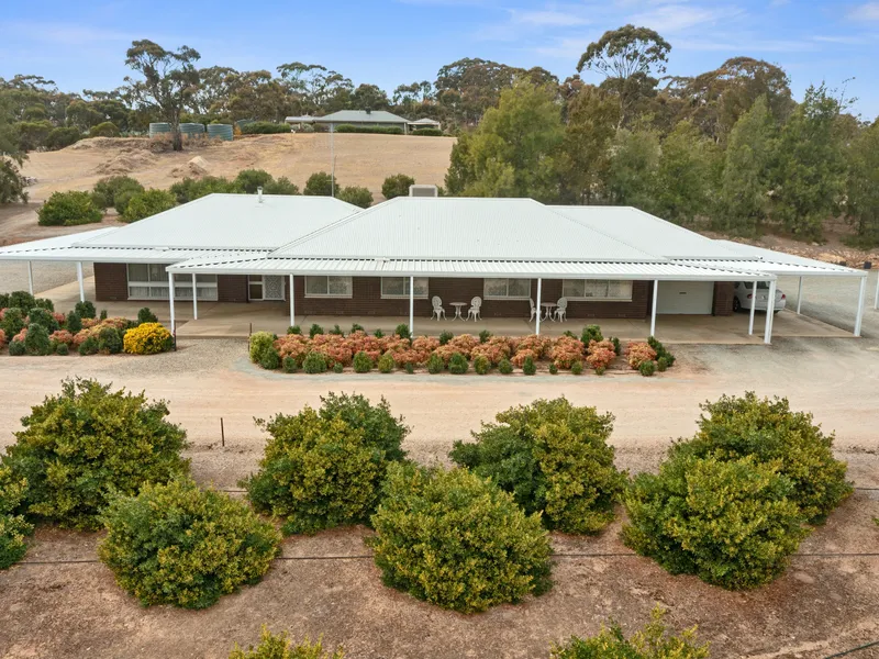 Immaculate 4 bedroom home on 8.6 acres