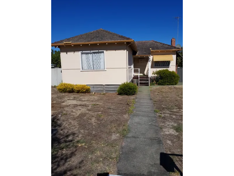 Two bedroom 1950's home with large sleep-out.