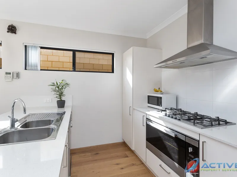 Modern, Low Maintenance Living in Prime Location!