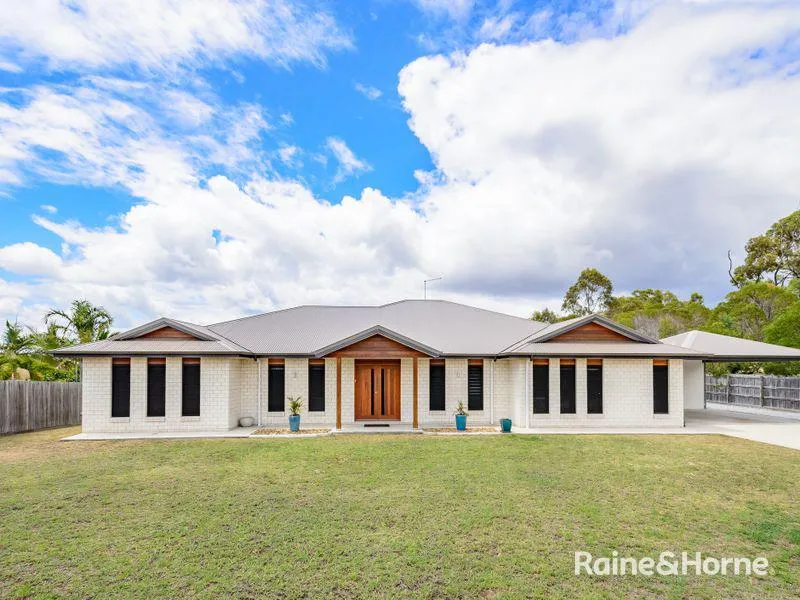 ACREAGE LIVING WITH THE POOL & THE SHED!