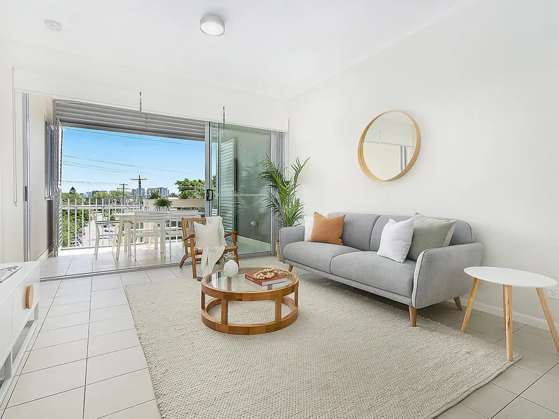 Boutique top floor apartment with CBD views