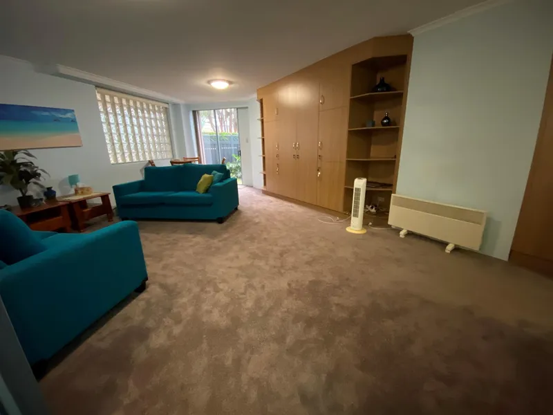 MODERN FURNISHED STUDIO WITH COURTYARD OPP SHOPPING CENTRE