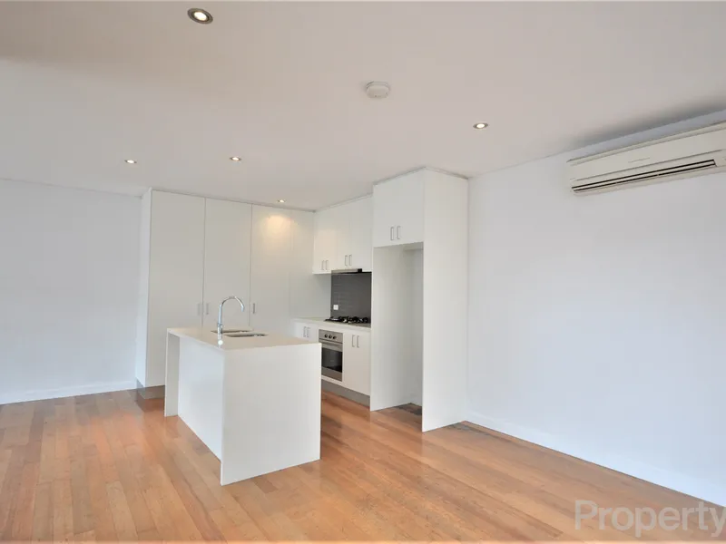 Two Bedroom Townhouse with Commercial Office/Study!