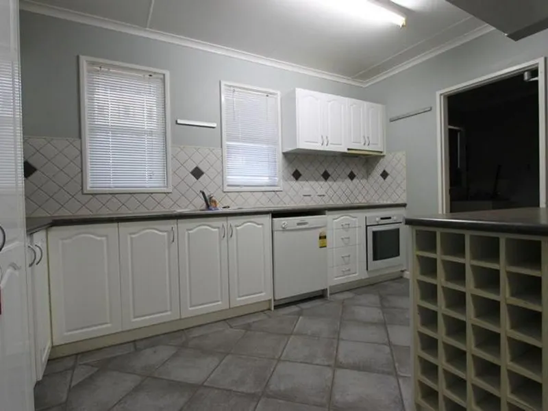 3X1 HOME WITH PARKING GALORE !!!