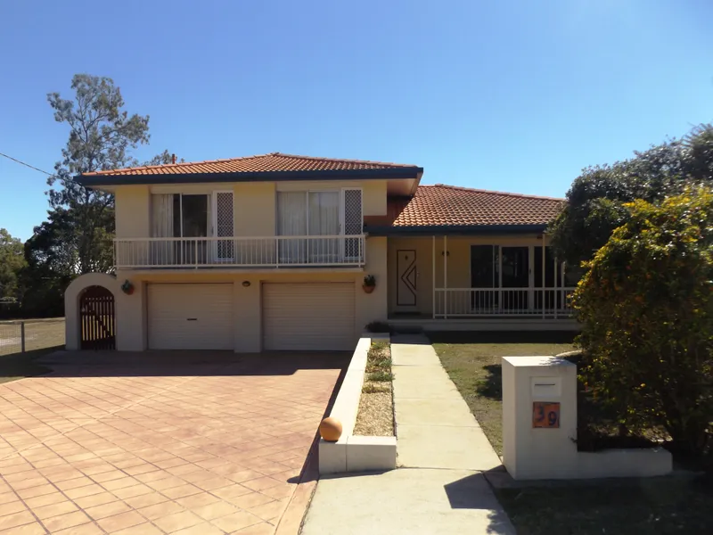Expansive Family Home on 1,012m2 Block - 5 Car Accommodation