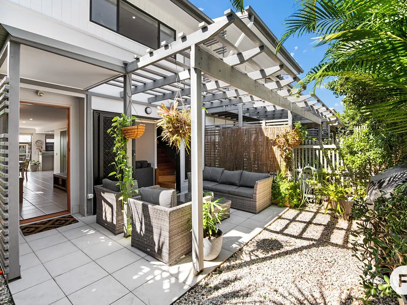 Spectacular three-bedroom townhome in sought-after suburb